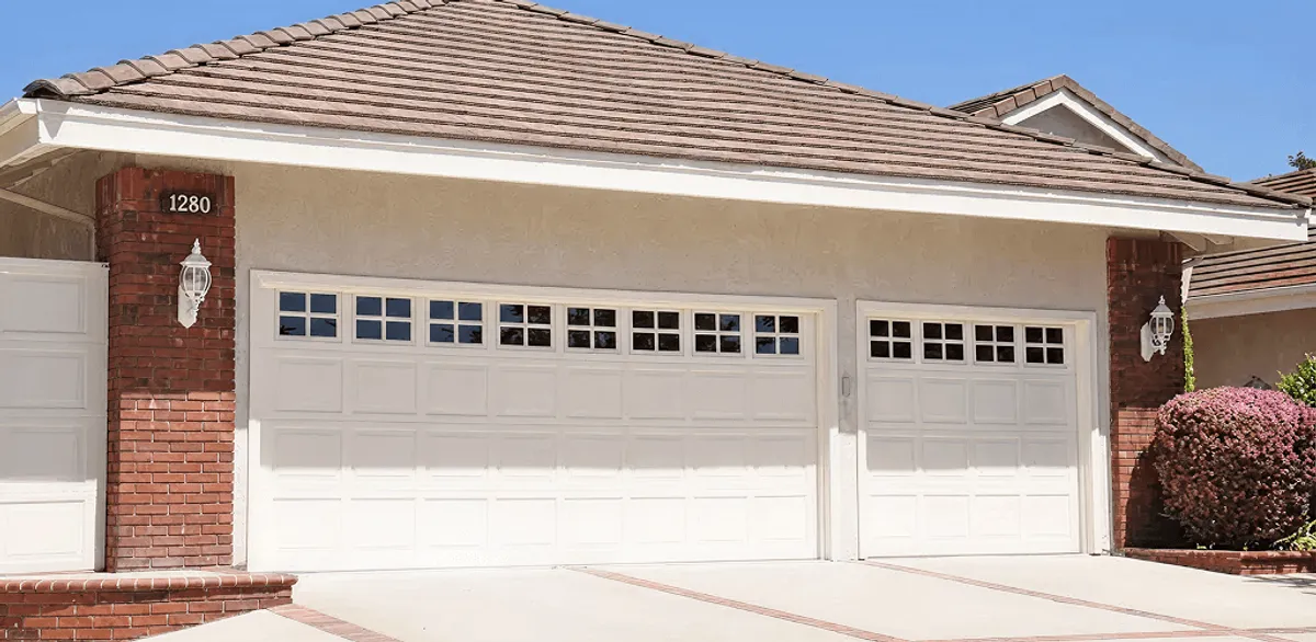 Residential garage door repair service for a double garage door in Honolulu, HI