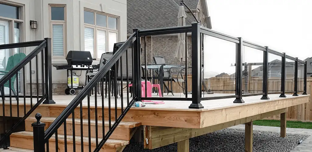 Handrail installation on a deck staircase for safety and code compliance in Honolulu, HI